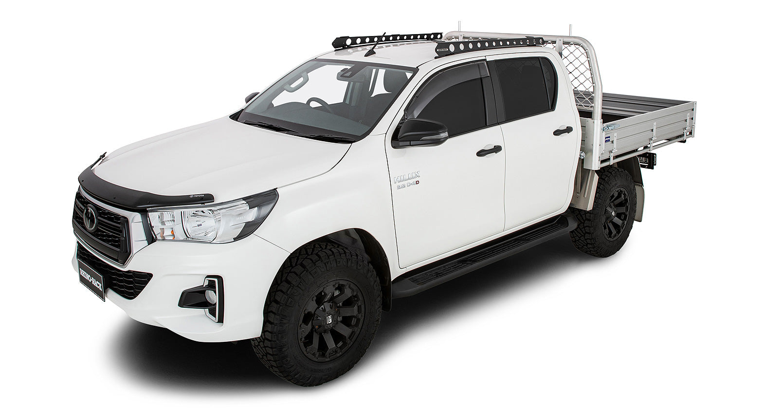 Système de fixation Backbone pour Toyota Hilux, accessoire Rhino-Rack, montrant la fixation robuste sur le toit du véhicule.
