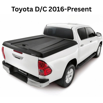 Couvre benne Aeroklas Speed en double coque ABS noir grainé pour pick-up double cab, installation sécurisée.