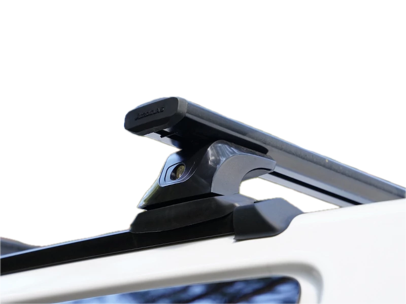 Barres de toit Aeroklas pour Hardtop Double Cabine, fixation solide pour véhicule utilitaire.