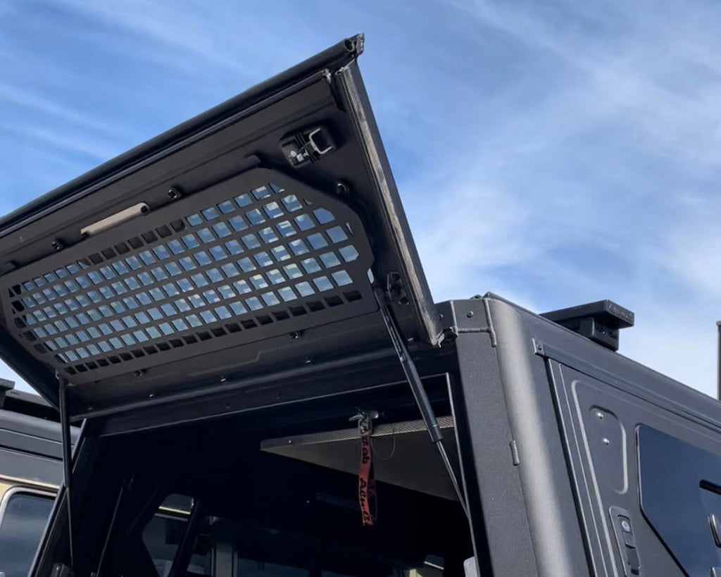 Grille de sécurité pour fenêtre arrière Alu-Cab Contour, protection maximale en aluminium, accessoires pour véhicule tout-terrain.