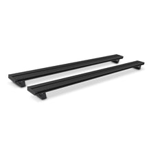 Kit de 2 barres de toit en aluminium Alu-Cab, montées sur véhicule, pour porte-bagages et accessoires.