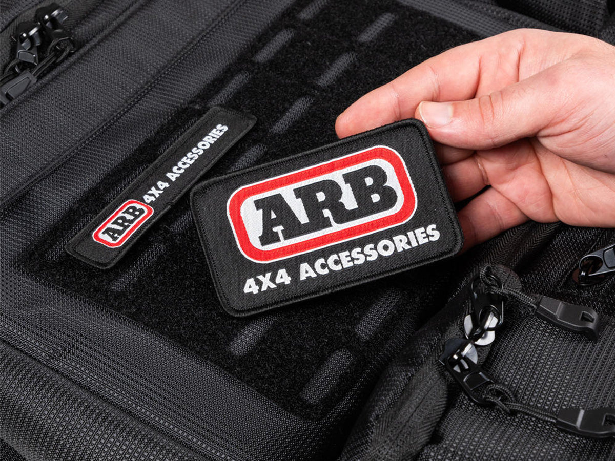 Organisateur de siège ARB4x4, sac de rangement robuste pour véhicule tout-terrain, en tissu durable, avec poches multiples.