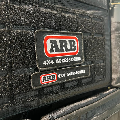 Sac de rangement ARB pour siège ARB4x4, organisateur pratique avec plusieurs poches pour outils et accessoires.