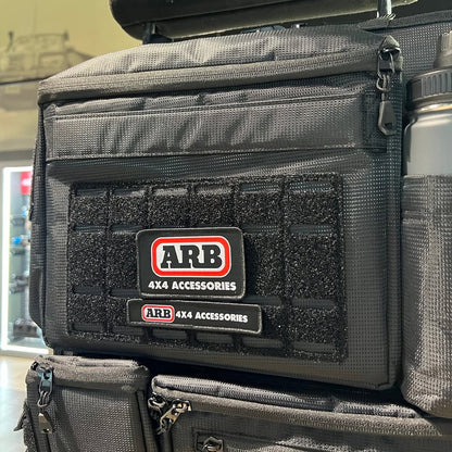 Organisateur de siège ARB4x4, sac de rangement robuste pour véhicule tout-terrain, avec plusieurs compartiments.
