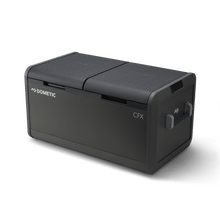 Réfrigérateur portable Dometic CFX5 95 DZ double zone, capacité 94L, en extérieur avec poignées et écran de contrôle.