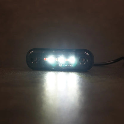 Éclairage LED Shadow Vision EEZEE POWER avec 3 couleurs, installé sur la calandre avant d'une voiture.