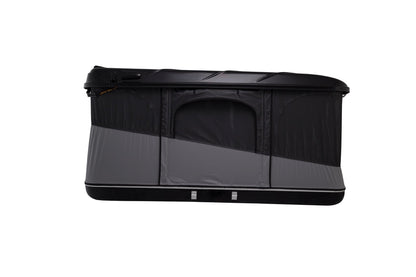 Tente de toit James Baroud Evasion S/M/XL avec coque rigide, vue de profil, installation sur véhicule tout-terrain.