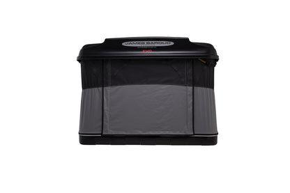 Tente de toit rigide James Baroud Evasion S/M/XL installée sur un véhicule, coque solide et design pratique pour camping en plein air.
