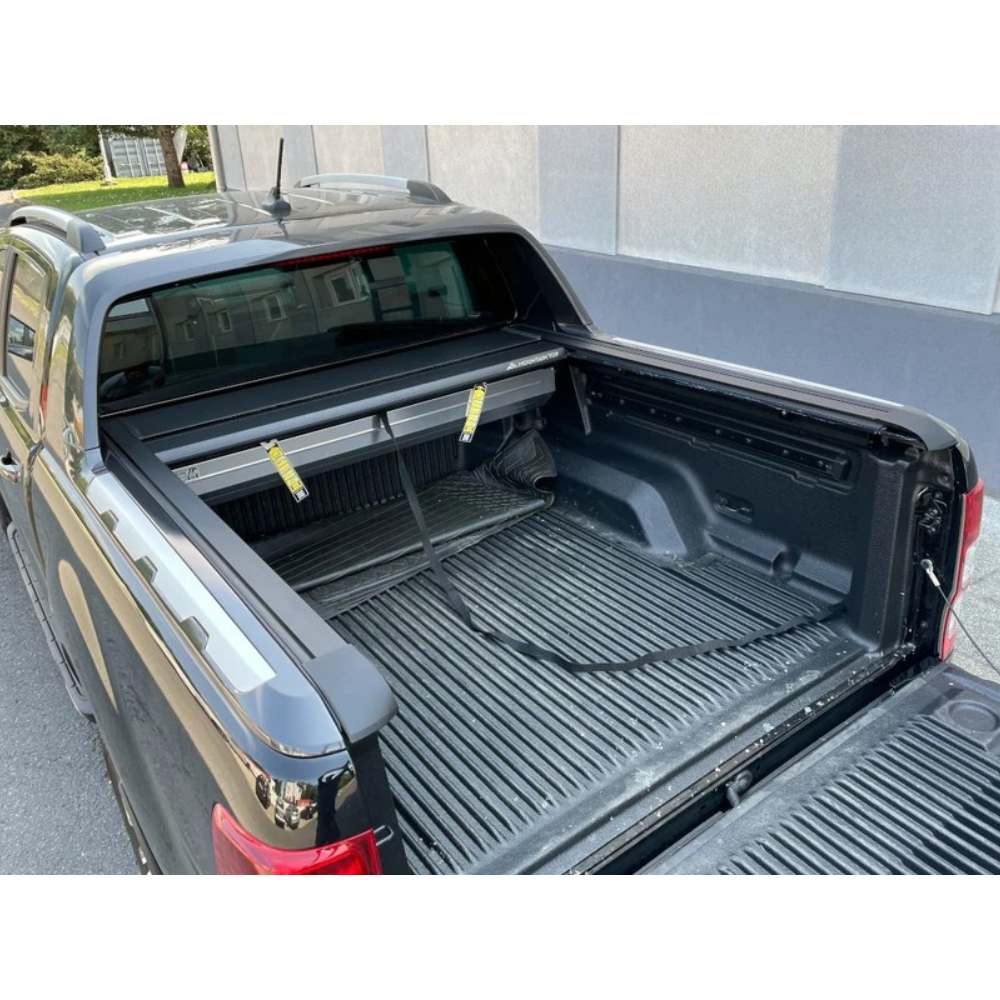 Rideau de benne manuel Mountain Top EVOm pour Ford Ranger/Raptor 2011-2022, couvre benne robuste et pratique.