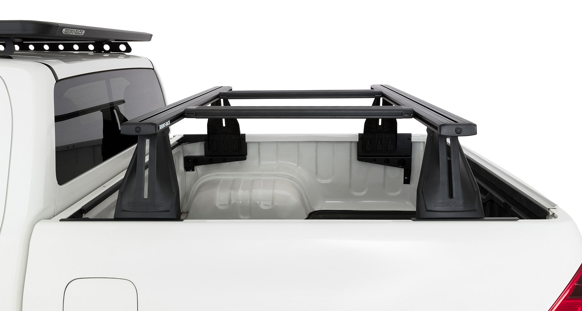 Kit de 2 barres de toit Rhino-Rack pour Toyota Hilux Revo 2015+ avec systèmes Reconn-Deck, longueurs 1500 mm, accessoires pour véhicule.