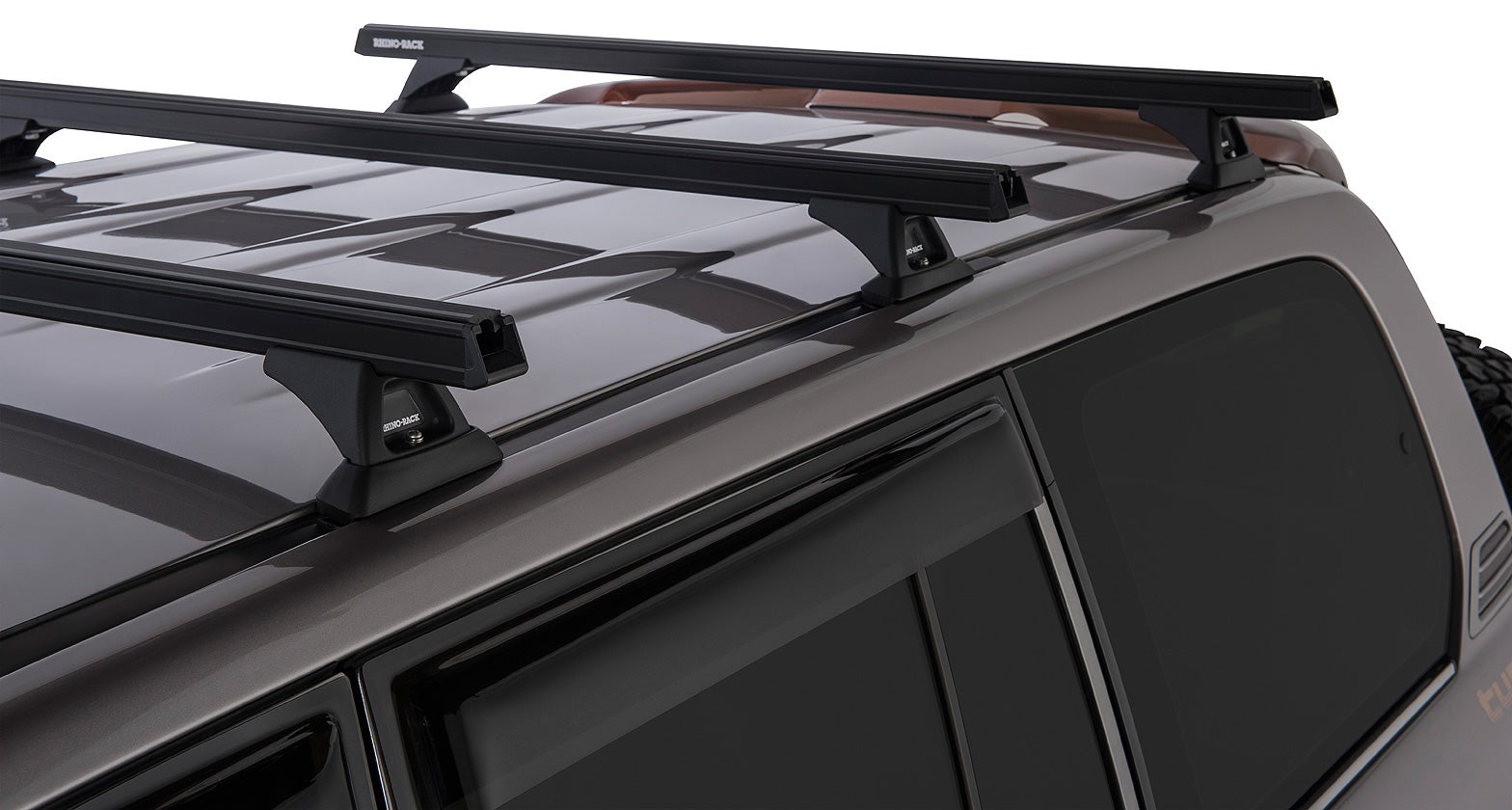 Kit de 3 barres de toit RHINO-RACK Heavy Duty pour Land Cruiser HDJ100, barres de toit robustes pour véhicule tout-terrain.
