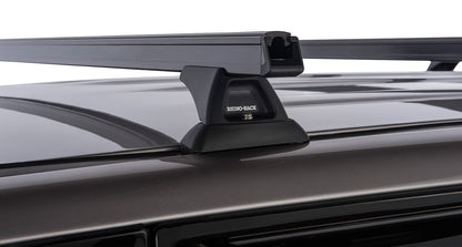 Kit de 3 barres de toit Heavy Duty RHINO-RACK pour Land Cruiser HDJ100, robustes et adaptées au transport sécurisé.