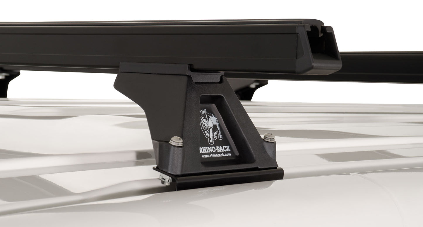 Kit de 4 barres de toit Heavy Duty 1500mm pour VW T5/T6 de la marque RHINO-RACK, montrant les barres en aluminium robustes.
