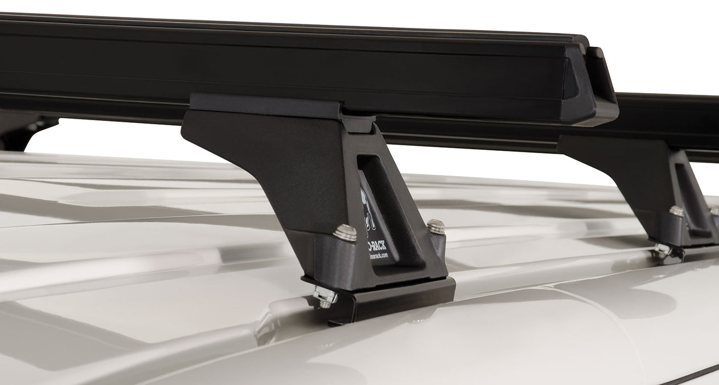 Kit de 4 barres de toit Heavy Duty 1500mm pour VW T5/T6 de la marque RHINO-RACK, montrant les barres robustes installées.
