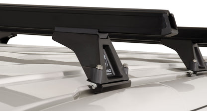Kit de 4 barres de toit Heavy Duty 1500mm pour VW T5/T6 de la marque RHINO-RACK, montrant les barres robustes installées.