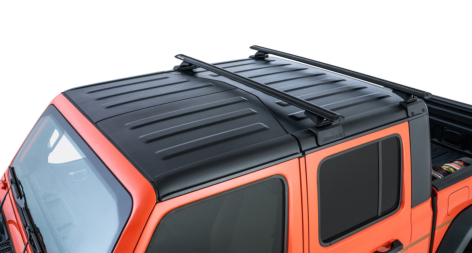 Kit de 2 barres de toit Backbone 1500mm pour Jeep Gladiator JT, de marque RHINO-RACK, montrant les barres de toit robustes.