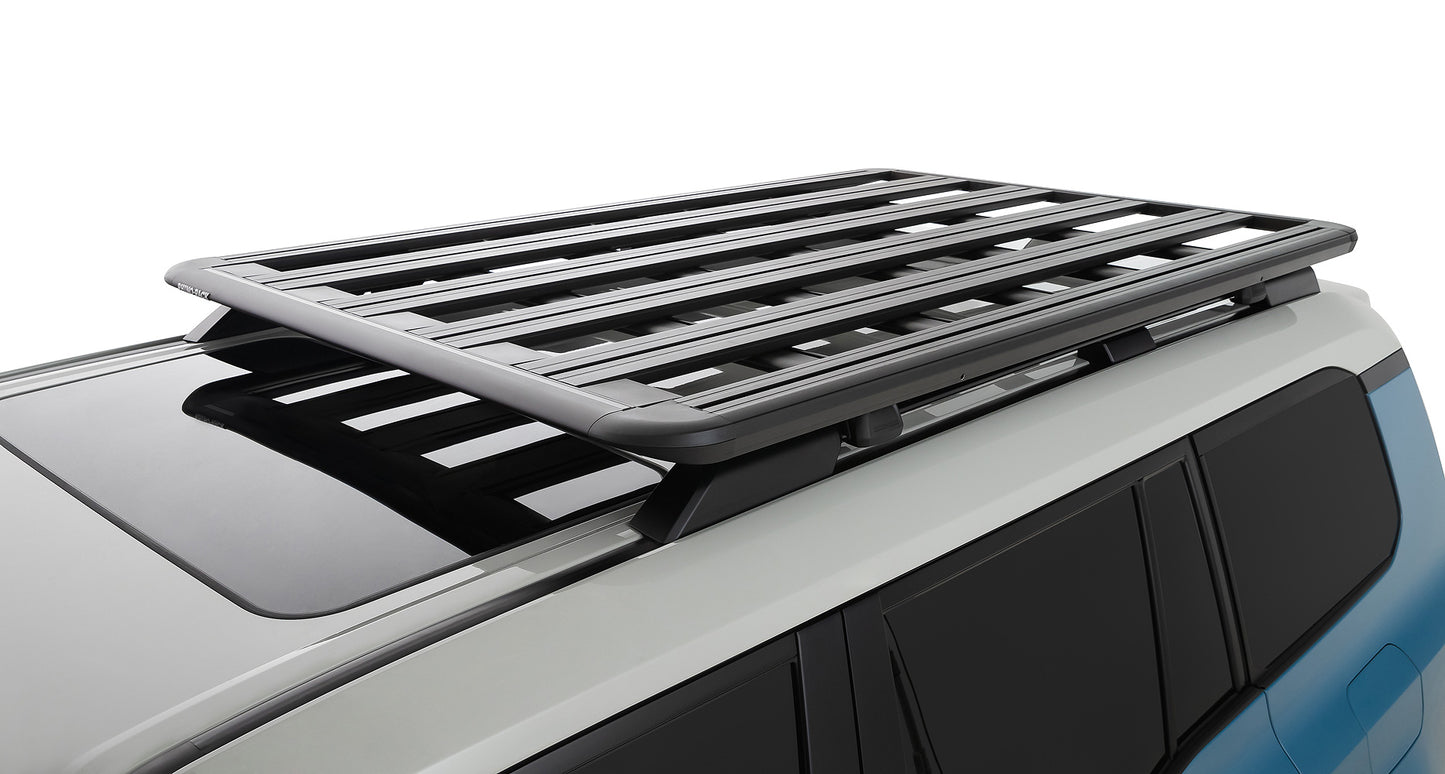 Galerie de toit Rhino-Rack pour Land Cruiser Prado 250 avec rails, montage solide pour transporter équipements et charges.