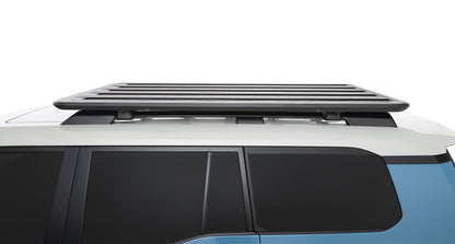 Galerie de toit RHINO-RACK pour Land Cruiser Prado 250 avec rails, robuste et adaptée pour transporter des charges lourdes.