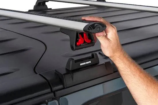 Kit de galerie de toit RHINO-RACK pour Hardtops Alu-cab Extra Cab, montage robuste pour véhicule utilitaire.