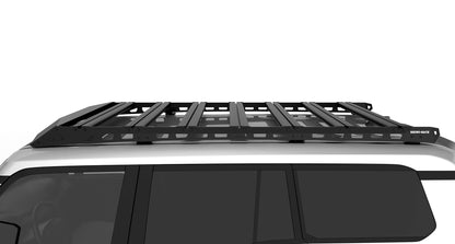 Kit galerie de toit Rhino-Rack pour Land Cruiser Prado 250, dimensions 2413x1219mm, avec barres et fixation robustes.