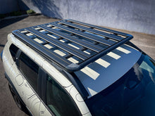 Kit galerie intégrale Pioneer RHINO-RACK pour Dacia Duster 2024+, galerie de toit robuste avec barres en aluminium.