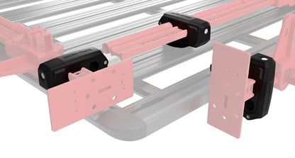 Kit d'installation rapide Stow-iT pour galerie ou barre, accessoire Rhino-Rack, facilitant la fixation sécurisée.
