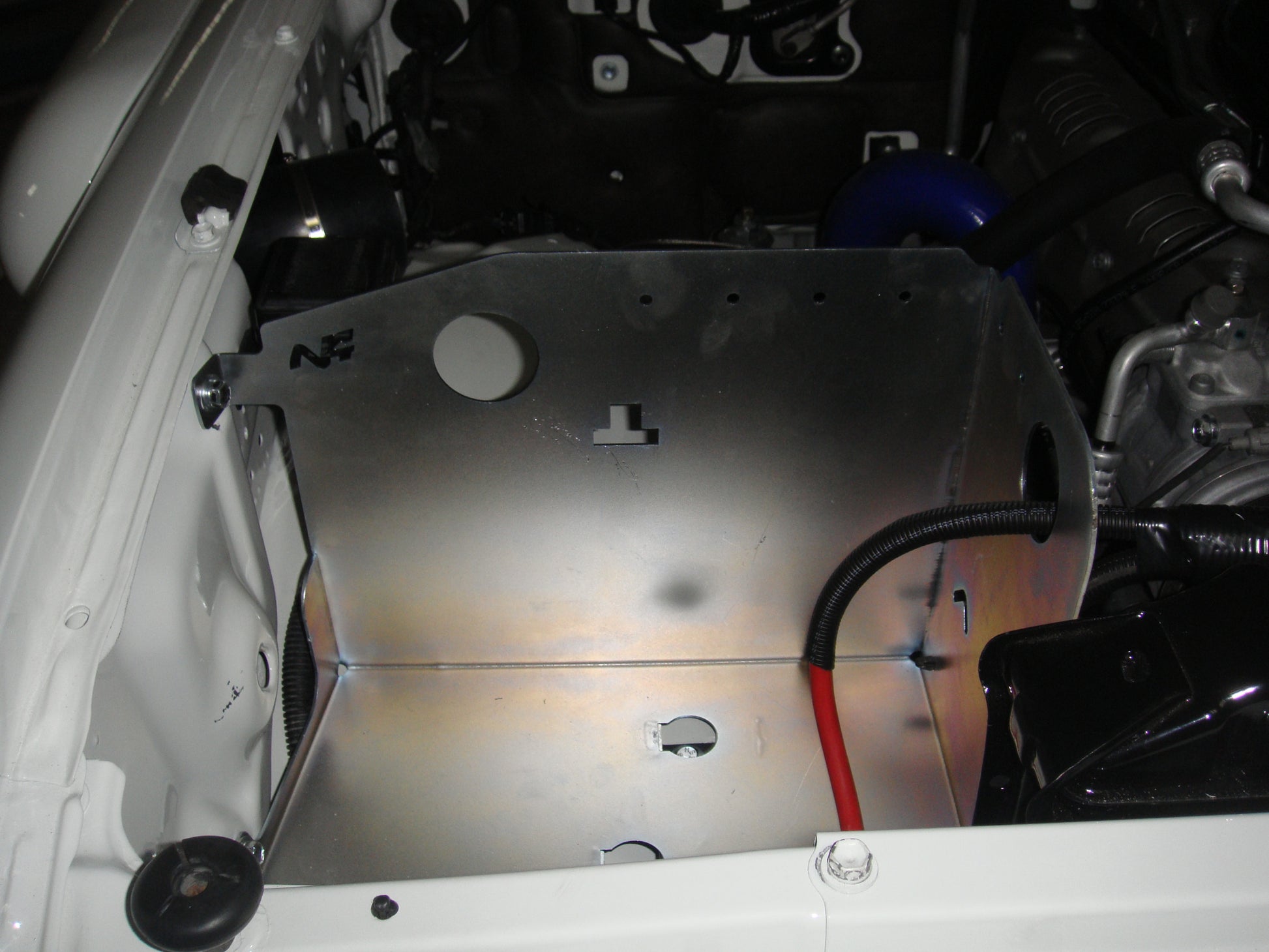 Paired steel battery trays for Toyota HDJ80 by N4-Offroad, durable accessories for off-road vehicle battery storage.