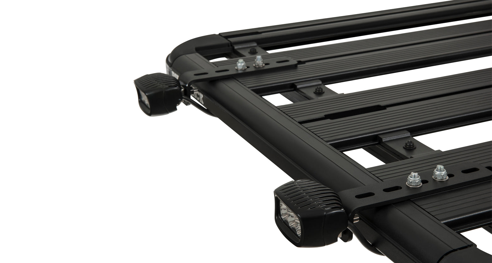 Support de fixation pour éclairage Pioneer SI de RHINO-RACK, accessoire robuste pour porte-bagages tout-terrain.