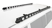 Système de fixation Backbone pour Pajero NP/NX, accessoires Rhino-Rack, montage robuste pour rack de toit Rhino-Rack.