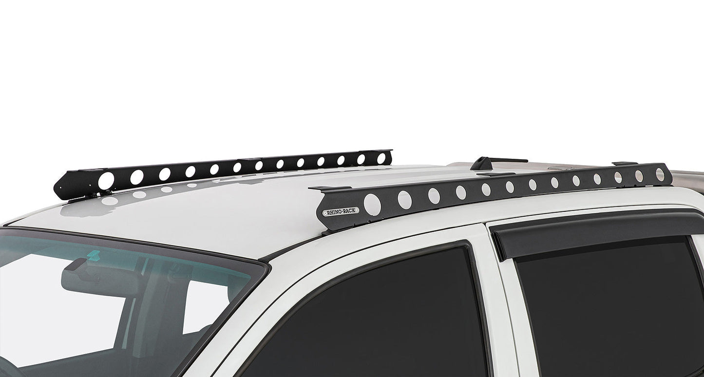Système de montage Backbone pour Toyota Hilux avec accessoires Rhino-Rack, support robuste pour rack de toit.