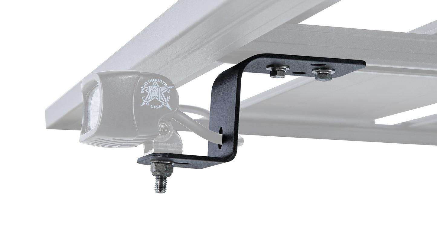 Support de phare Pioneer pour Rhino-Rack, accessoire robuste en métal noir, fixé sur un véhicule tout-terrain.