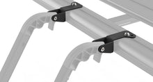 Support d’échelle Rhino-Rack Pioneer, accessoire pour porte-échelle, en métal robuste, fixé sur véhicule tout-terrain.