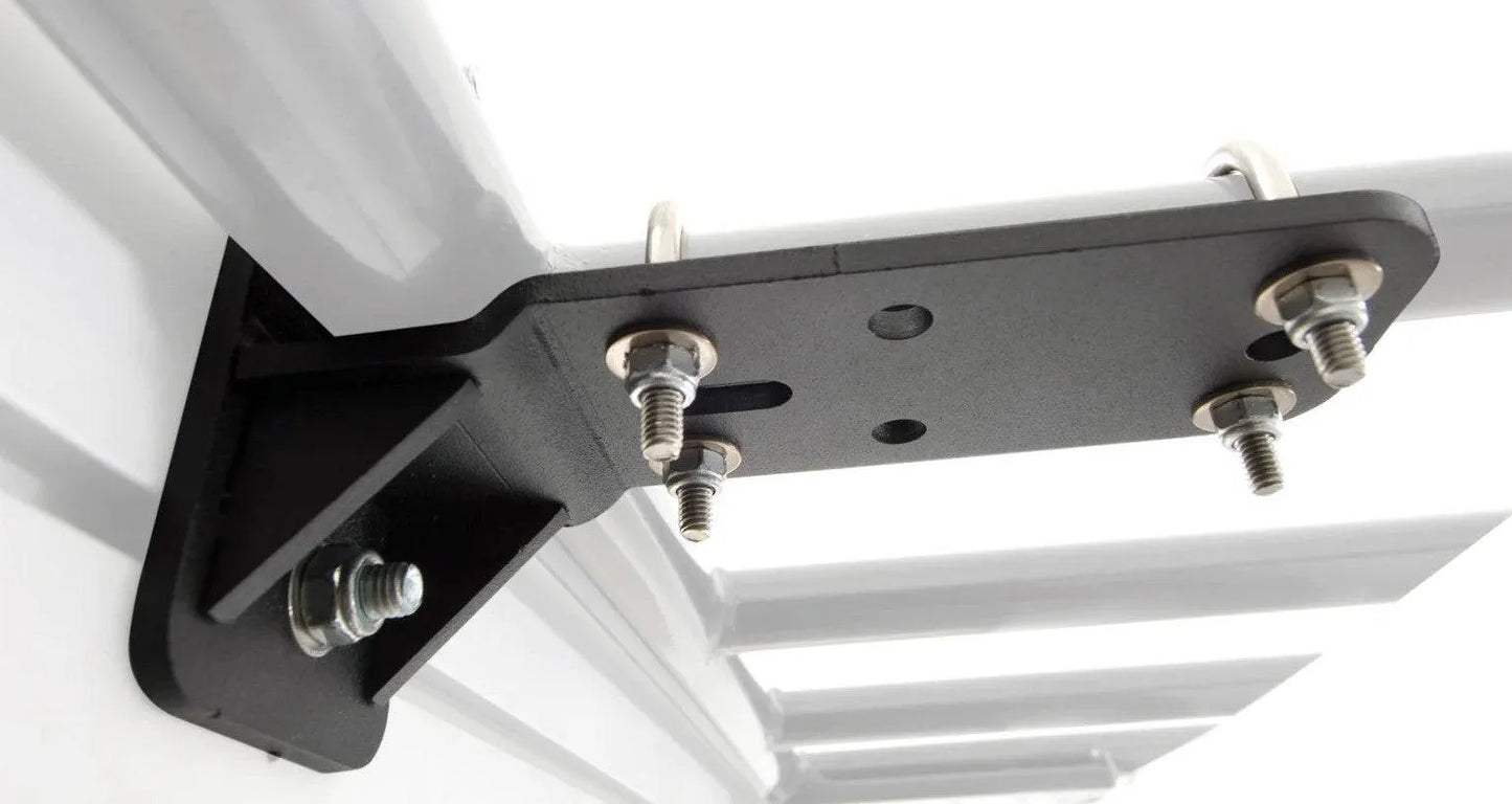 Support fixation auvent Rhino-Rack pour galeries tubulaires, accessoire robuste pour fixer un auvent sur un véhicule.