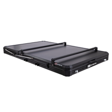 Paired ARB Intrepid roof tent crossbars kit, accessories for roof tent, black metal bars on tent roof, outdoor camping gear.