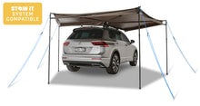 Auvent circulaire 270° Batwing Compact 2m de RHINO-RACK, version droite avec fixations STOW IT, pour véhicule tout-terrain.
