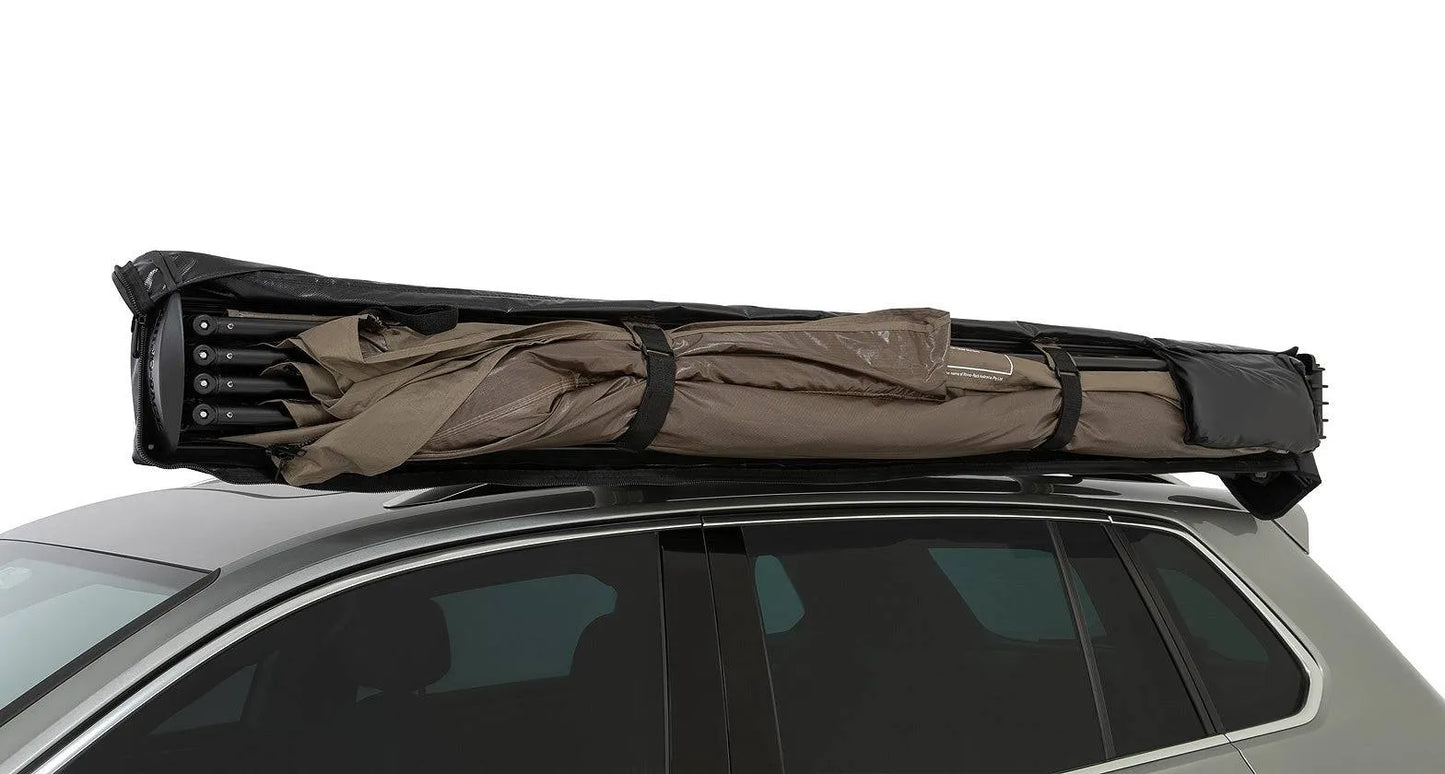 Auvent circulaire 270° Batwing Compact 2m gauche de RHINO-RACK avec fixations STOW IT, pour véhicule tout-terrain.
