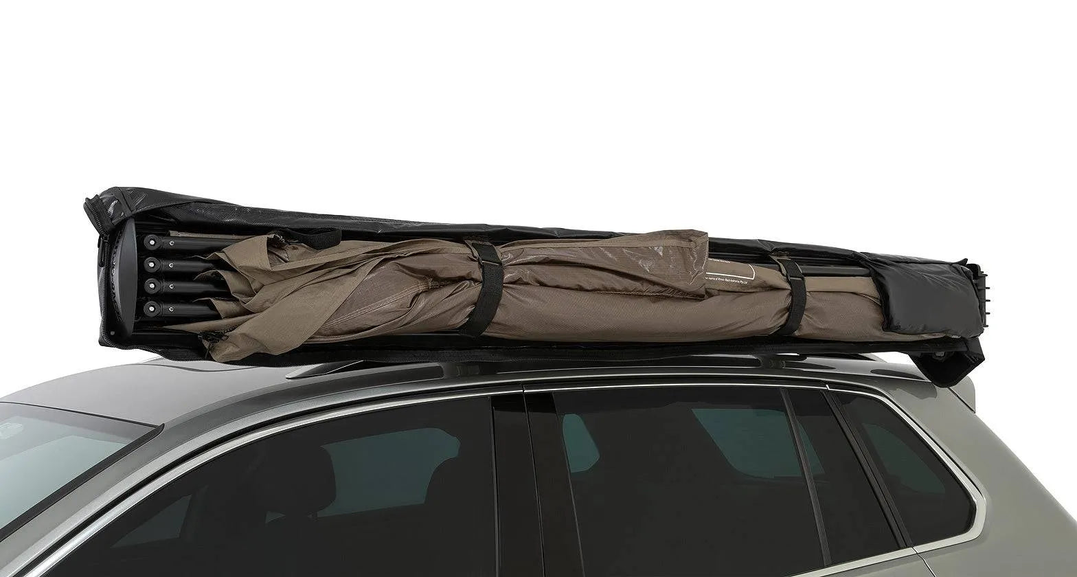 Auvent circulaire 270° Batwing Compact 2m gauche de RHINO-RACK avec fixations STOW IT, pour véhicule tout-terrain.