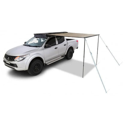 Auvent latéral Sunseeker de RHINO-RACK avec fixations STOW IT pour véhicule tout-terrain.