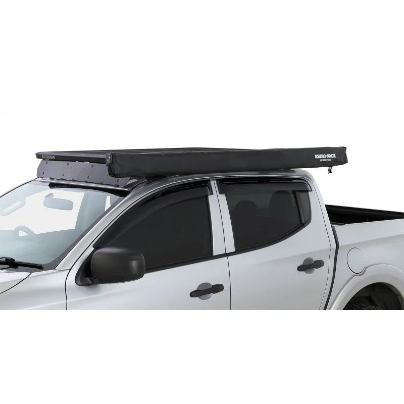 Auvent latéral Sunseeker de Rhino-Rack avec fixations STOW IT pour véhicule tout-terrain.