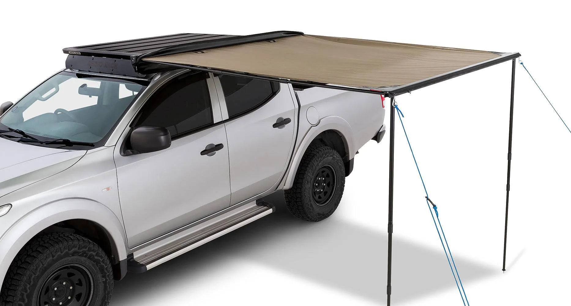 Auvent latéral Sunseeker de Rhino-Rack avec fixations Stow It pour véhicule tout-terrain, en tissu résistant et robuste.