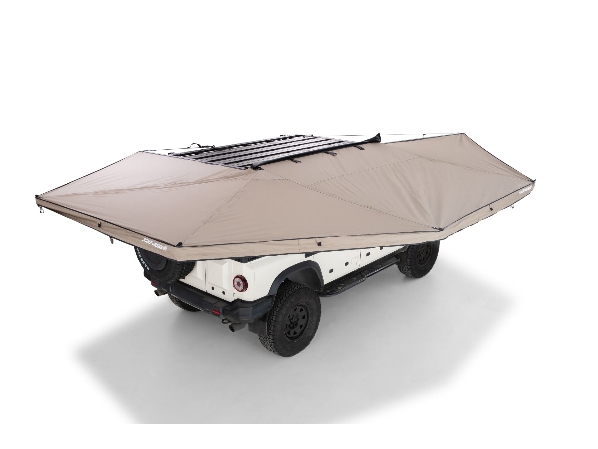 Auvent auto-portant RHINO-RACK 270° avec paroi latérale droite, pour véhicule tout-terrain, fixation robuste et design durable.
