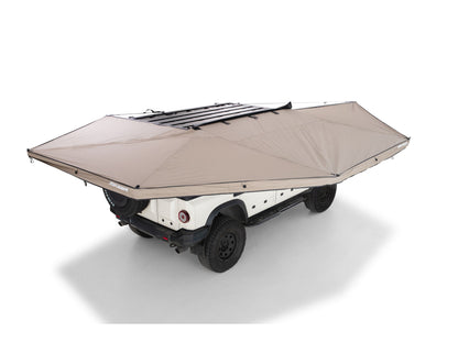 Auvent auto-portant RHINO-RACK 270° avec paroi latérale droite, pour véhicule tout-terrain, fixation robuste et design durable.