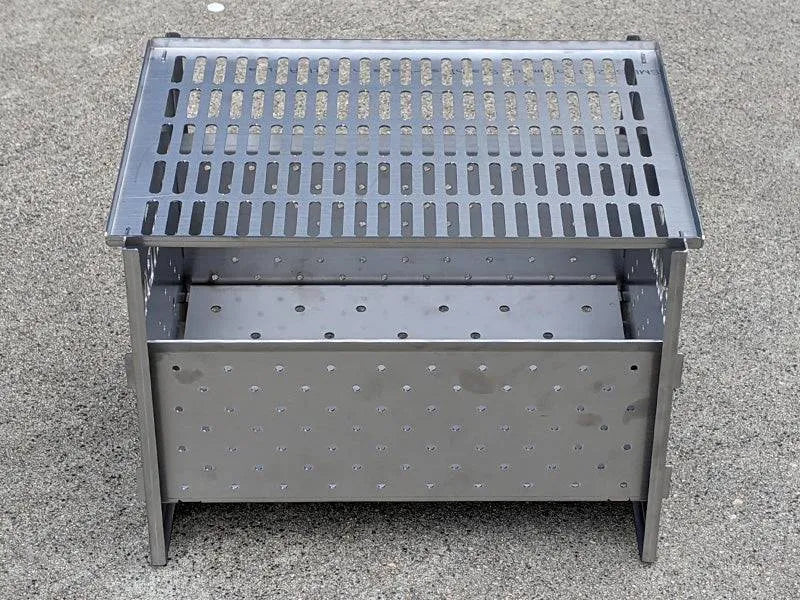 Foyer de barbecue SMARTCAP RSI SMARTCAP en acier, compact et robuste pour cuisson extérieure.