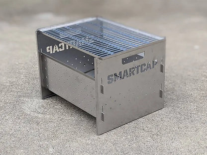 Foyer de barbecue SMARTCAP de RSI SMARTCAP, brasero en métal avec grill pour cuisson en plein air.