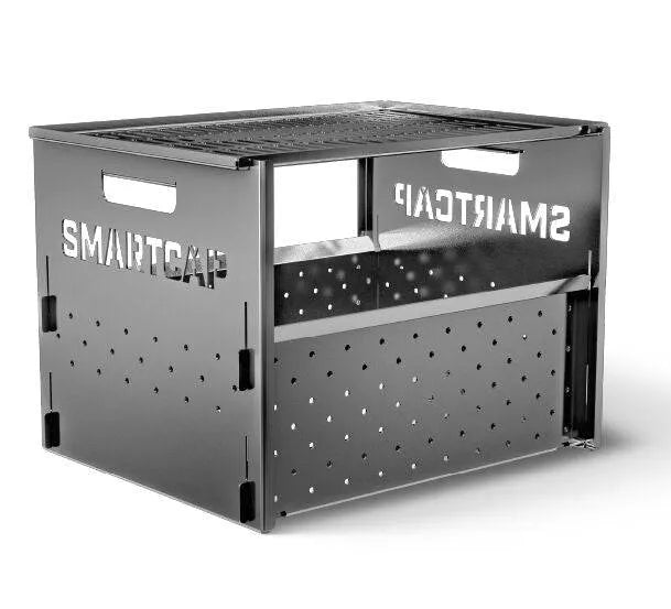 Feu de camp barbecue SMARTCAP RSI, brasero en acier avec grille pour cuisson en extérieur, image montrant le brasero allumé.