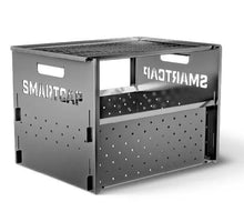 Feu de camp barbecue SMARTCAP RSI, brasero en acier avec grille pour cuisson en extérieur, image montrant le brasero allumé.