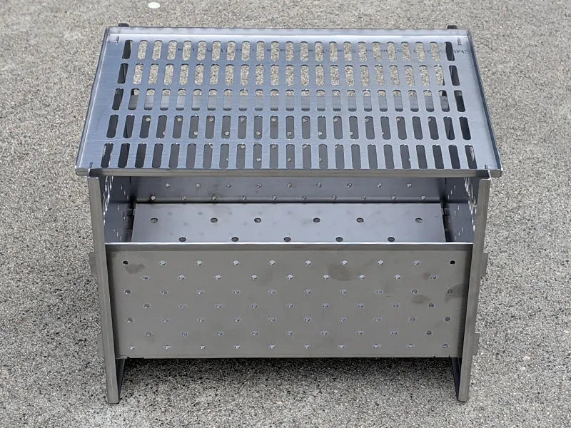 Foyer de barbecue SMARTCAP RSI SMARTCAP en acier avec grille de cuisson pour grillades en plein air.