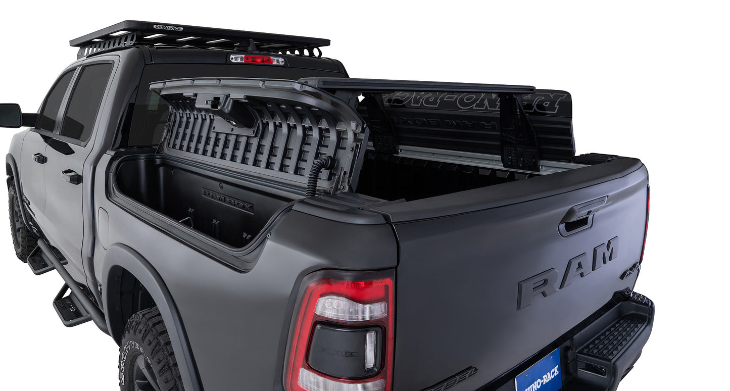 Kit de 2 barres de toit de 1260 mm pour Dodge Ram, système Reconn-Deck, marque RHINO-RACK, fixations robustes pour véhicule.