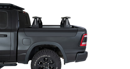 Kit de 2 barres de toit pour Dodge Ram, système Reconn-Deck, marque RHINO-RACK, 1260 mm, adaptées au montage sur véhicule.