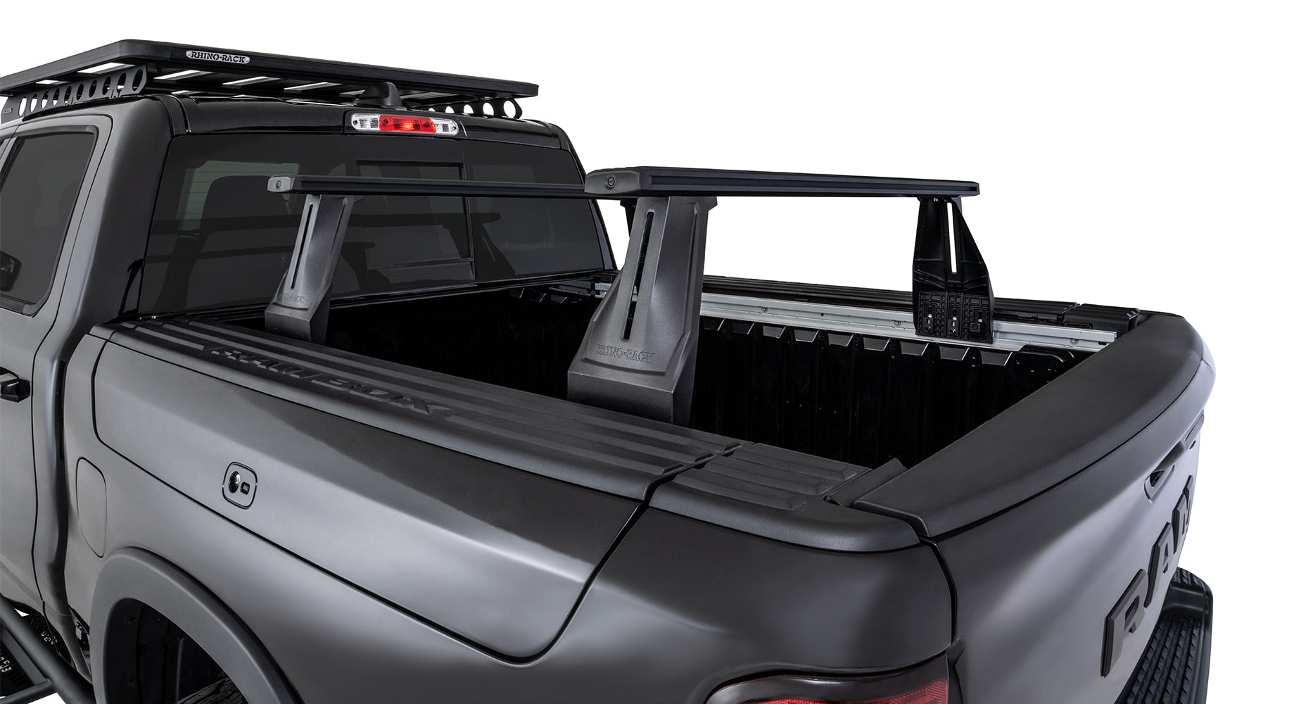 Kit 2 barres de toit Reconn-Deck RHINO-RACK pour Dodge Ram, longueur 1260 mm, fixation robuste pour véhicule utilitaire.
